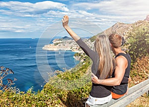 Happy couple enjoying the view of Dubrovnik on their travels