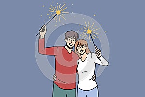 Happy couple with fireworks celebrate New Year