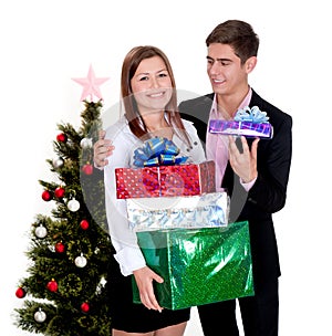 Happy couple with gifts for Christmas