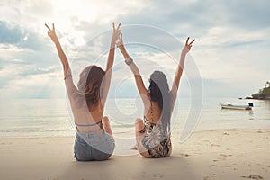 Lovers young couple of girls. On the beach . Concept of LGBT