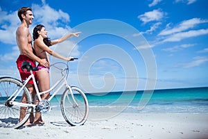 Happy couple going on a bike ride