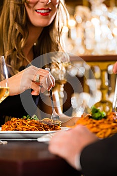 Happy couple have a romantic date in restaurant