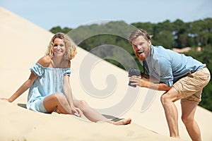happy couple having fun on beach