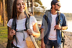 Happy couple having fun outdoors and smiling.