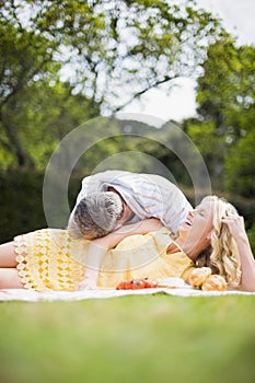 Happy couple having a picnic