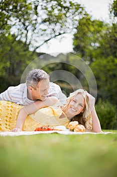 Happy couple having a picnic