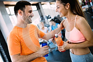 Happy couple in a health club