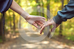 Happy couple holding hands