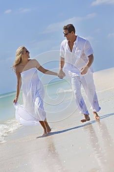 Happy Couple Holding Hands on A Tropical Beach