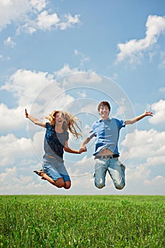 Happy couple jumping