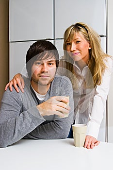 Happy couple in kitchen