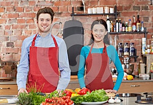 Happy couple in kitchen at cooking class