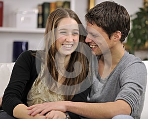 Happy couple in living room