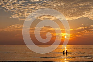 Happy couple in love enjoy luxury sunset