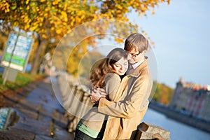 Happy couple in love on the Fontanka embankment