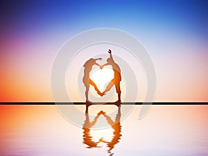 A happy couple in love making a heart shape
