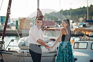 Happy couple in love on a summer holiday vacation.Celebrating holiday,anniversary,engagement. Woman laughing at a joke