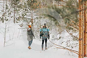 The happy couple in love of young man and woman at forest nature park. Travel adventure love story