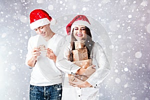 Happy couple man and fat woman celebrate Christmas and new year.