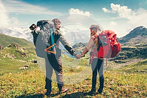 Happy Couple Man and Woman backpackers together photo