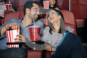 Happy couple at the movie theater