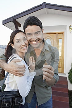 Happy Couple With New Home Key