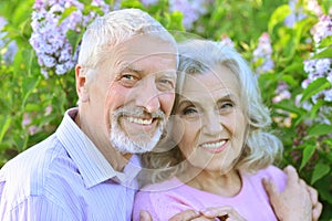 Happy couple posing in park