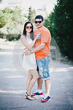 Happy couple posing in the park