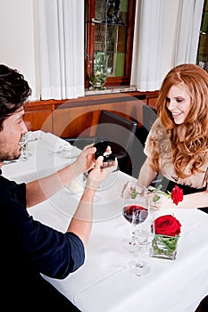 Happy couple in restaurant romantic date