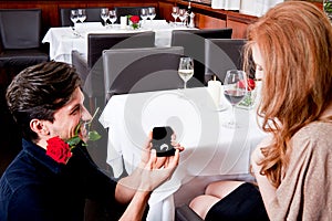 Happy couple in restaurant romantic date