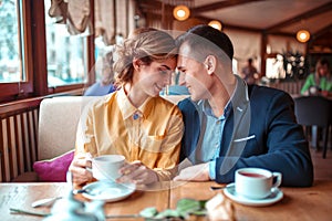 Happy couple, romantic date in restaurant