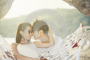 Happy couple in romantic scene at sunset. Love, wedding and valentine concept