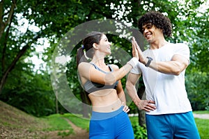 Happy couple running and jogging together outdoor