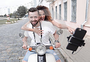 Happy couple traveling on motorcycle.Travel concept