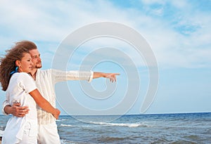 Happy couple on sea