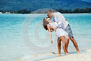 Happy couple sea beach travel kiss