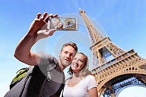 Happy couple selfie in Paris