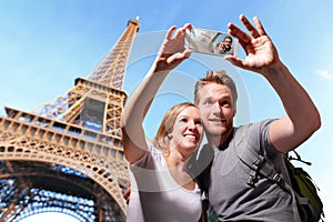 Happy couple selfie in Paris
