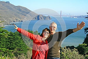 A happy couple in SF, Golden Gate Bridge