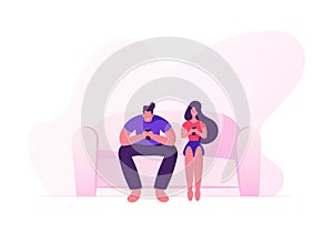 Happy Couple Sitting on Sofa with Smartphones. Young Man and Woman Relaxing at Home Together with Digital Devices