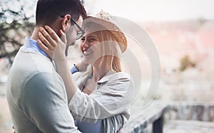 Happy couple smiling and dating outdoor