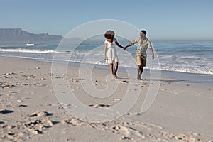 Happy couple spending time together on the beach