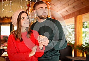 Happy couple spending time during winter vacation