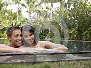 Happy Couple In Swimming Pool