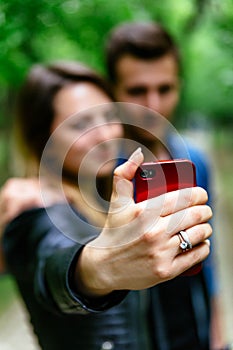 Happy couple taking self portrait