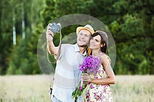 Happy couple taking selfie