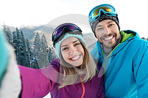 Happy couple taking selfie during winter vacation