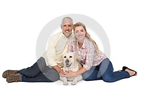 Happy couple with their pet dog