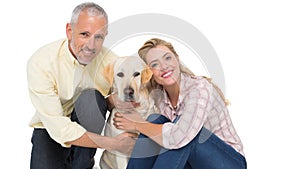 Happy couple with their pet dog