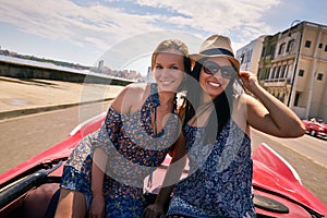 Happy Couple Tourist Girls On Vintage Car Havana Cuba